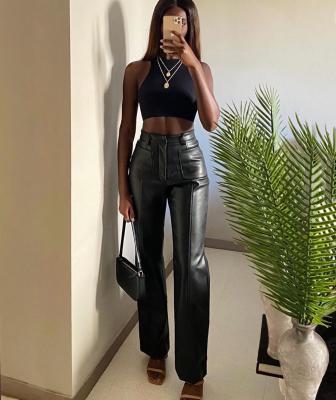 China KZ-8604 anti-static 2021 autumn and winter new fashion women's solid color pocket PU bag hip pants leather pants wide leg pants women for sale