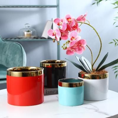 China Simple, lightweight and luxurious ceramic flowerpot gold edge household modern electroplating creative desktop flowerpot for sale