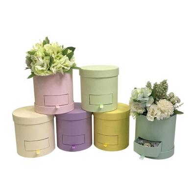 China Recyclable Round Small Flower Bucket Drawer Plug Bucket Paper Flower Box for sale