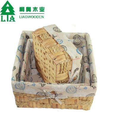 China Cheap Handmade Unique Wooden Handles Wicker Basket Laundry Baskets for sale