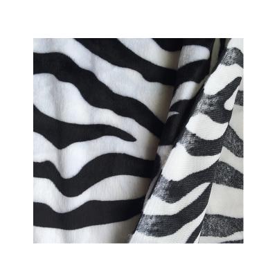 China Custom Shrink-Resistant Zebra / Cow Pattern Penetrating Printed Velboa Fabric for sale