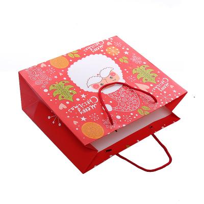 China Recyclable Customize Design Christmas Gift Bags Cartoon Pattern Package Of Foldable Portable Bag for sale