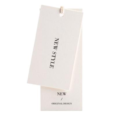 China Waterproof Hanging Tags Design Service Clothing Paper Swing Custom Product Hang Tags For Garment for sale