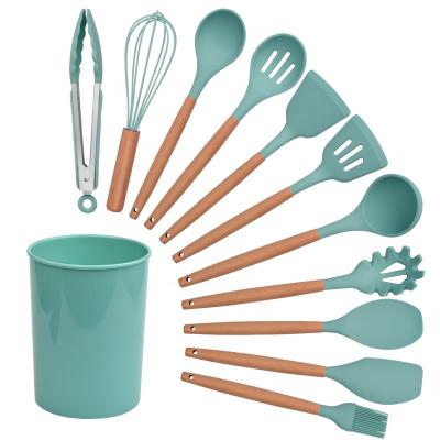 China New Arrival Viable Ins Style Colorful Food Grade Silicone 12pcs Wooden Handle Kitchen Utensil Set With Stand for sale