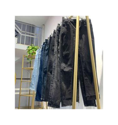 China Good Price Indigo Blue Abrasive Mixed Fabric Size Popular Summer Used Clothing Pants for sale