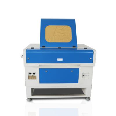 China Laser Engraving CO2 Laser Cutter 7050 Laser Engraving Machine 60w 80w 5070 Laser Engraving Machine for sale