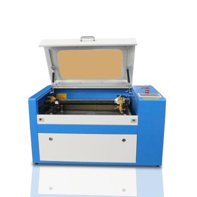 China Laser Engraving Focus FL-350 Automatic CO2 50w Aluminum Laser Label Engraving Machine for sale