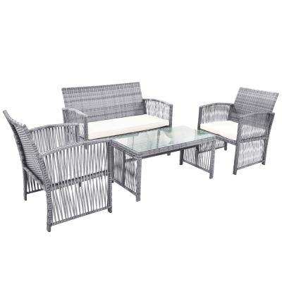 China Modern Waterproof Outdoor Dining Table And Chair 4 Seater Furniture Rattan Patio 4 Pcs Garden Sofa Sets for sale