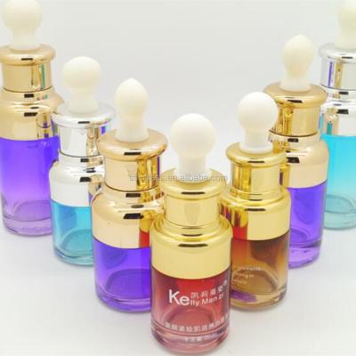 China 20ml 30ml 50ml clear essential oil chemical bottle with gold base and cap for sale