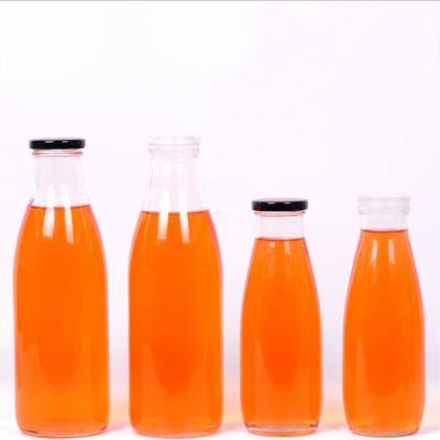 China Daily Life Large Capacity 1L Storage Empty Glass Bottles Drinking Drinking Bottles With Metal Lids for sale