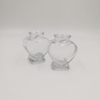 China High Quality Small 75ml Heart Shape CANDY Gift Bottle Clear Glass Bottle With Soft Cork for sale