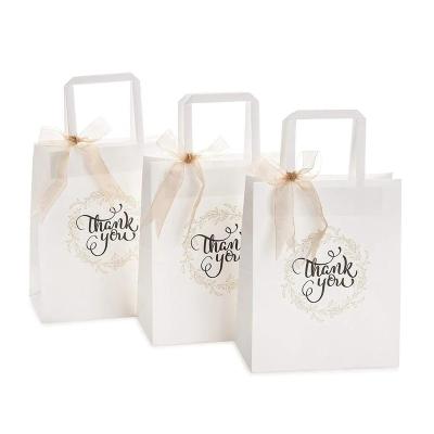 China Recycled Materials Wholesale Premium White Paper Gift Shopping Packaging Bag Thank You Printed With Cheap Price for sale