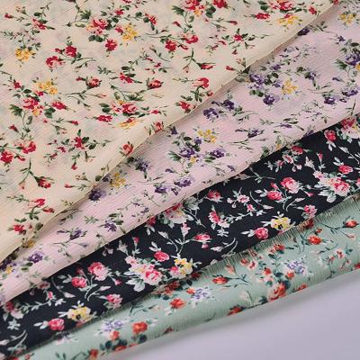 China Anti-Static Wholesale Stock Roll 100% Polyester Chiffon fabric Lightweight Soft Woven Chiffon Printed Fabric For Women Clothing for sale