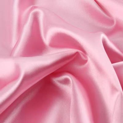 China Anti-Static High Glossy Satin Crepe Fabric Soft Silk Satin Gold And White Fabric 100% Fabric Textile for sale