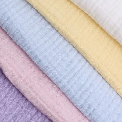 China Anti-Static Solid color plain and white double gauze woven 100% cotton bubble muslin fabric for swaddle baby blanket for sale