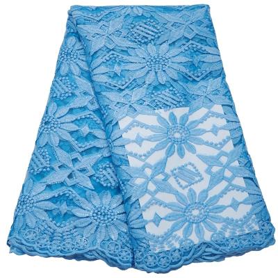 China 2022 African French Milk Sky Blue Hot Sale 2797 Viable Embroidery Mesh Lace Fabric Silk Net Tulle With Sequins For DIY Dress for sale