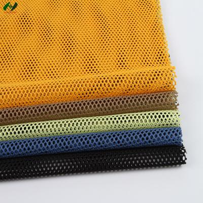 China Shrink-Resistant Blue Polyester Non-Stretch Open Weave Hexagonal Mesh Fabric for sale