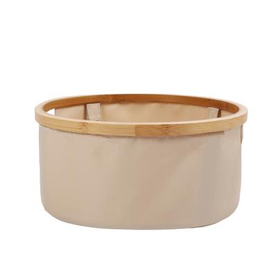 China Hot Sales Sustainable Canvas Fabric Rolling Up Rods Folding Bamboo Rack Storage Barrel Baskets For Organization for sale