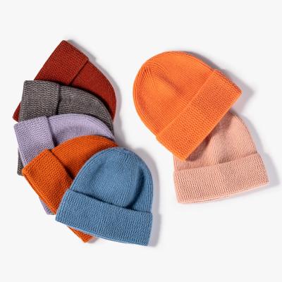 China COMMON soft neutral concise style solid color high grade wholesale price quality wool sheep winter knitted hats for sale