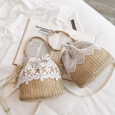 China Fashion Temperament Holiday Rattan Beach Holiday Resort Cross-Body Straw Woven Fairy Beach Carry Bag For Women for sale