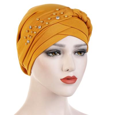 China Feel Uniq Comfortable Designer Solid Single Braid Beading Pearl Turban Crystal Muslim Ladies Hat For Woman Hair Wrap Hat for sale