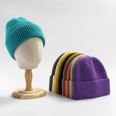 China Wholesale Fashionable Custom Embroidery COMMON Logo Solid Color Warm Winter Beanie Knit Hat for sale