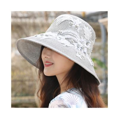 China Wholesale Japanese Brim Large Foldable Hat Summer Paper Image Papyrus Flower Decoration Beach Handmade Beaded Straw Hats For Women for sale