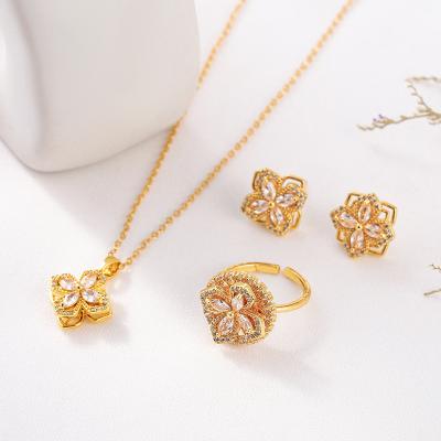 China CHENGYI FASHION Jewelry Set Zircon Ladies Necklace Earrings Ring Rotating Section Four Leaf Clover Luxury Brass Inlaid Set Pendant for sale