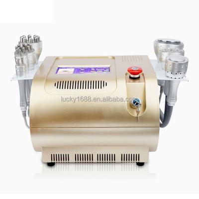 China Weight Loss 7 in 1 Hot Cold Hammer/Cavitation Multifunction Beauty Device RF Vacuum Slimming Beauty Machine for sale