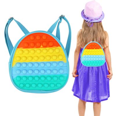 China Portable Relaxing Children Kids Educate Bag Silicone Busy Person Pushing Sound Sensory Backpack with Adjustable Straps for sale