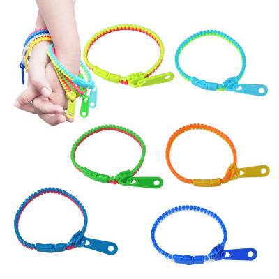 China 20CM Busy Person Pull Up Toys Funny Neon Basket Stuffers Easter Wristbands Sensory Toys For Kids Teens for sale