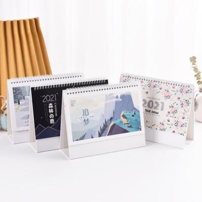 China 2021 Color Recyclable Custom Size White Color Fold Custom Size 2021 Logo Art Cartoon Style Art Cartoon Paint Paper Desk Rack Creative Desk Calendar for sale