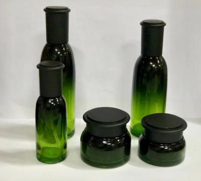 China Green Glass Cosmetic Packaging / Safety Skin Care Containers / Cream Jar/ Lotion Bottle for sale