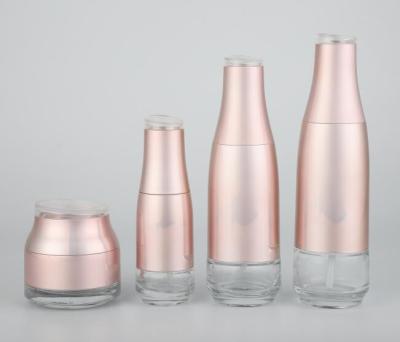 China Pink Glass Cream Jar Lotion Bottles Cosmetic Packaging Customized Logo And Color for sale