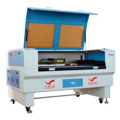 China Good Price 80w 100w 130w 150w Wood Laser Cutter CNC CO2 Laser Cutter Automated Loading Engraving Machine 1390 For Non Metal for sale