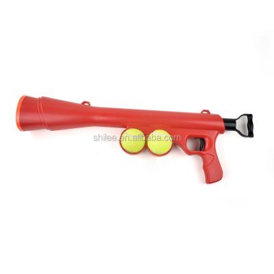 China Dog Ball Launcher Training Toy Dog Tennis Ball Launcher Viable Stocked Gun with 2 Squeaky Balls for sale