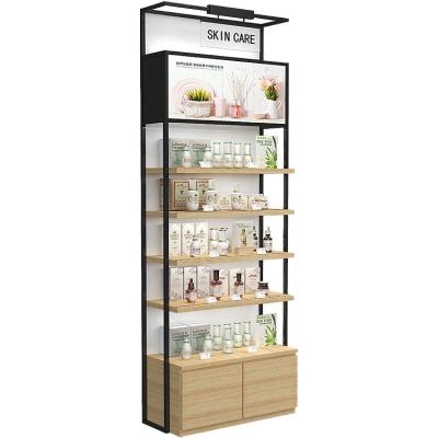 China Simple and modern cosmetics and skincare products showcase cabinet cosmetics shop display racks for sale