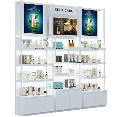 China Simple and modern wooden custom cosmetics store showcase display stand cosmetic displays for sale