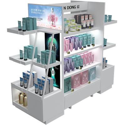 China Suitable for cosmetic skin care products shelf display iron and wooden cosmetics island cabinet skin care display cabinet for sale