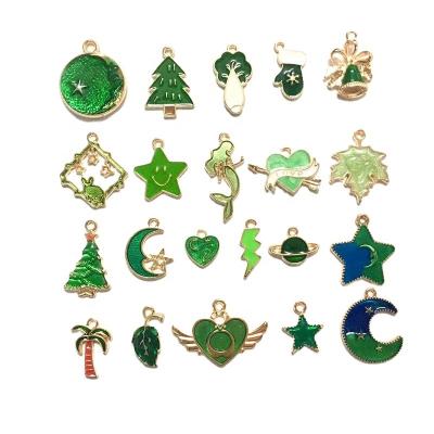 China Cute Green Leaf Mermaid Cute Charm Clip Christmas Star Moon Planet Planet Star Christmas Tree Bell Dangling Bracelet Jewelry Making for sale