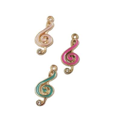 China 100pcs Cute Oil Ornament Accessories Diy Zinc Alloy Drip Jewelry Making 22*10MM Enamel Music Symbol Shape Charm Pendant for sale