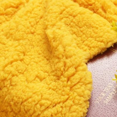 China Solid Warm Granular Comfortable Soft Sueded Single Side Brushed Wadding Bonded Fabric for sale