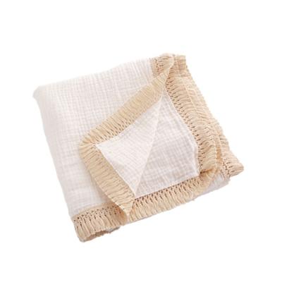 China 2021 Anti-Static New Release OEM Muslin Cotton Wrap Fringe Tassel Newborn Wrap Organic Wrap Cotton Baby Blanket for sale