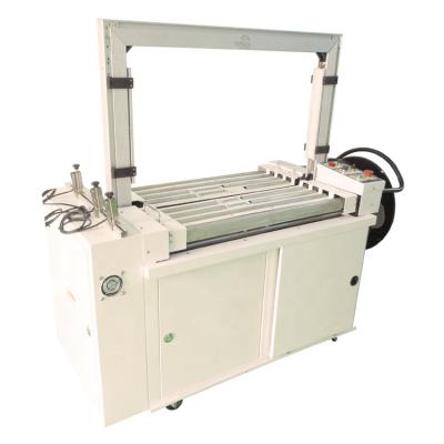 China Fully Automatic Food Box Strapper PP Carton Strapping Machine for sale