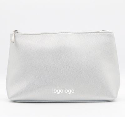 China NATIONAL Hot Selling PU Bag Quality Texture PU Cosmetic Smooth Water-based Smooth Silvery Makeup Bag Durable Travel Toiletries Bag for sale