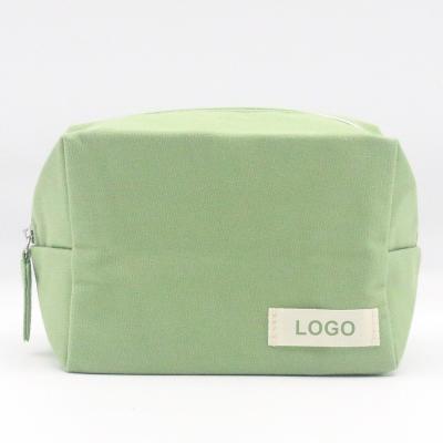 China 2022 Summer Minimalist Fashionable Canvas Cosmetic Bag Durable Letter Shape Eco-friendly Fresh Green Cotton Fabric Canvas Cosmetic Bag for sale