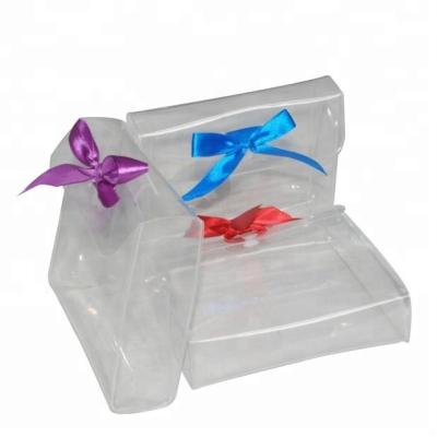 China Recyclable Clear PVC Gift Bag With Blue Satin Ribbon Bow for sale