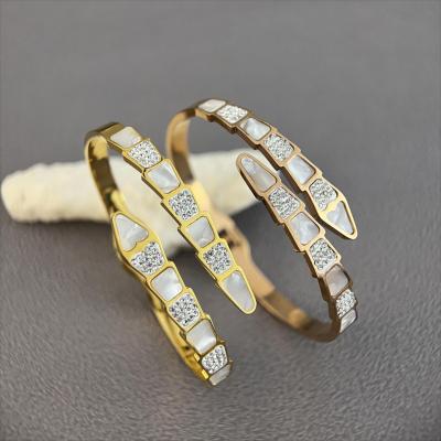 China FASHIONABLE Hot Sale Luxury Jewelry Snake Shaped Elastic Opening Stainless Steel Gold Women Bracelet for sale