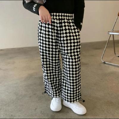 China 2021 Viable White Black Checker Kids Pants Kids Trousers Pants For Girls for sale