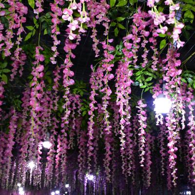 China Hot Sale Plastic Garland Decor Ceiling Wisteria Flowers Silk Plastic Wedding Party Hanging Decorative Vine for sale